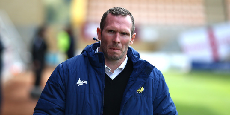 League Two boss targeted for United role