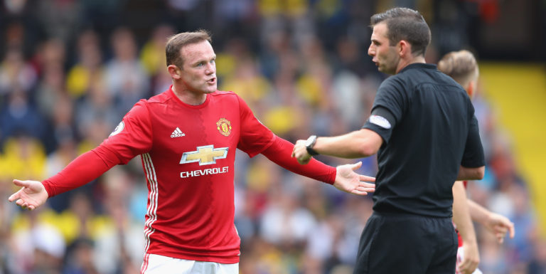 Why does Wayne Rooney divide opinion among United fans?