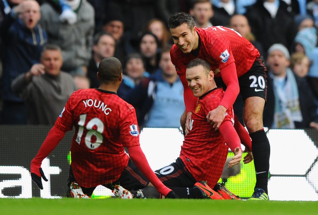 Wayne Rooney playing for Manchester United, used as academy scholarship context for Kai Rooney