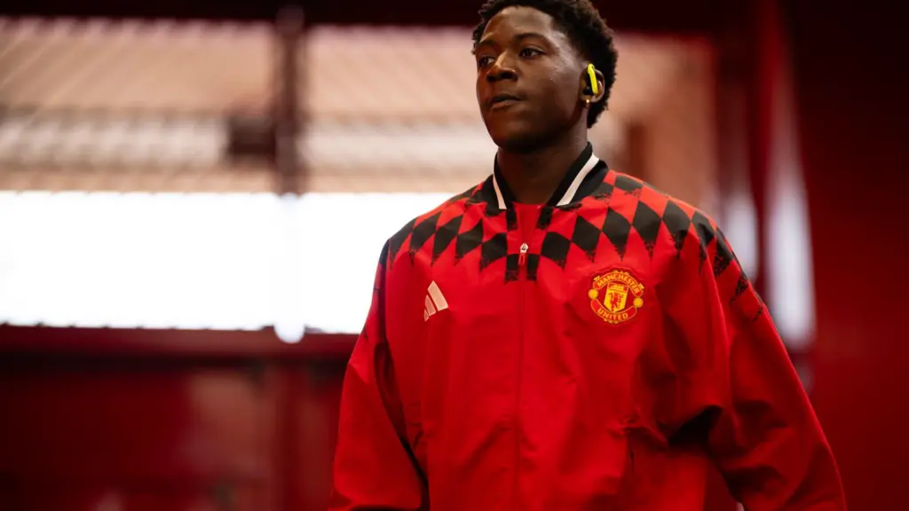 Kobbie Mainoo representing Manchester United during a midfield feature image