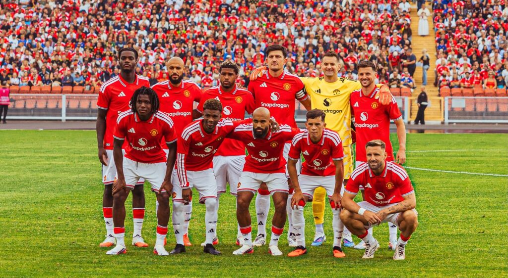 Man Utd players pose for a pre-match photo.