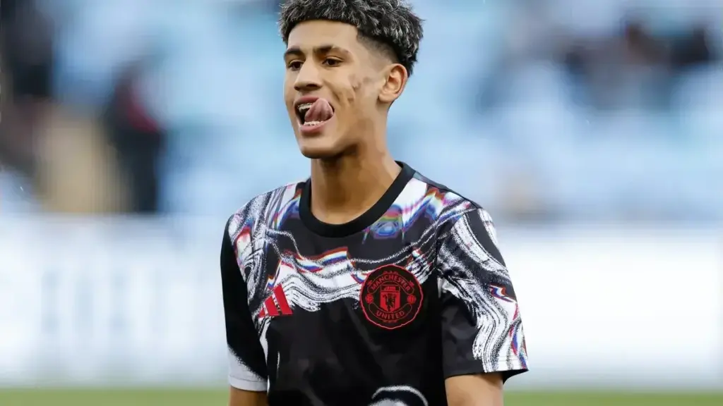 JJ Gabriel exit: JJ Gabriel, Manchester United youth player, in a Manchester United kit during a warm-up moment at an academy/youth match